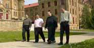 A photo of people walking on the grounds at Saint Meinrad.