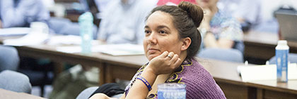 Photo of a woman in a classroom.